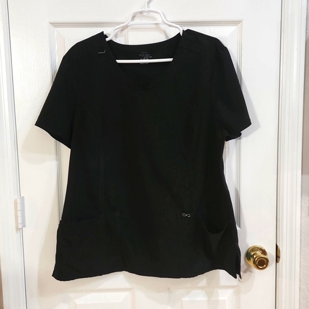 2 scrub tops and 2 scrub skirts